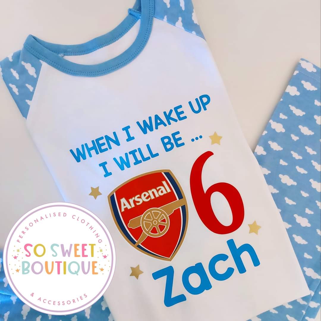 Personalized Arsenal FC birthday pyjamas with "When I Wake Up" text, featuring Arsenal team logo and soft fabric for kids.