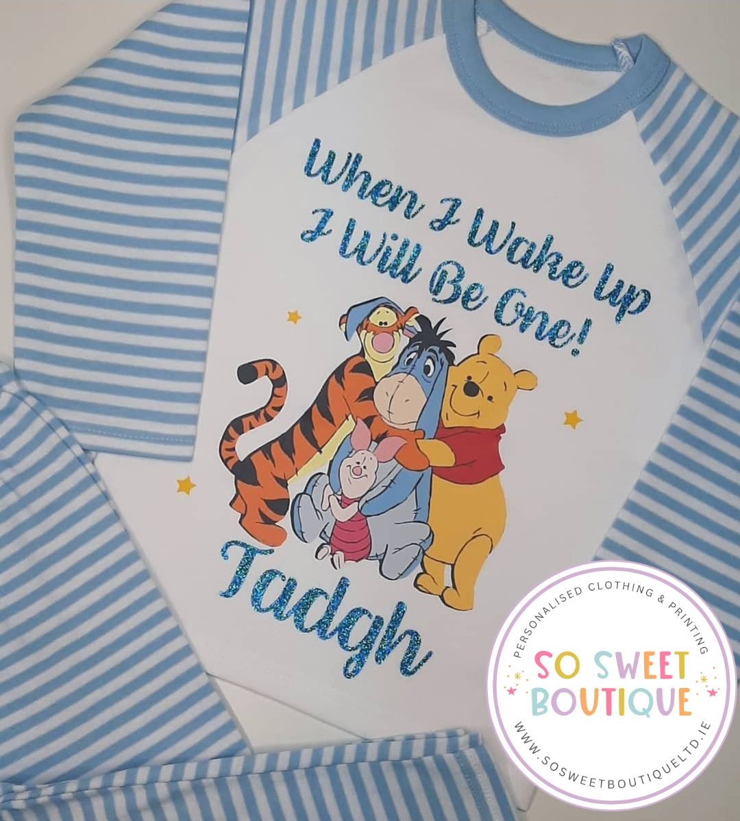 Personalized Winnie the Pooh birthday pajamas for kids, featuring cheerful Pooh design and soft fabric from SoSweetBoutiqueLtd.