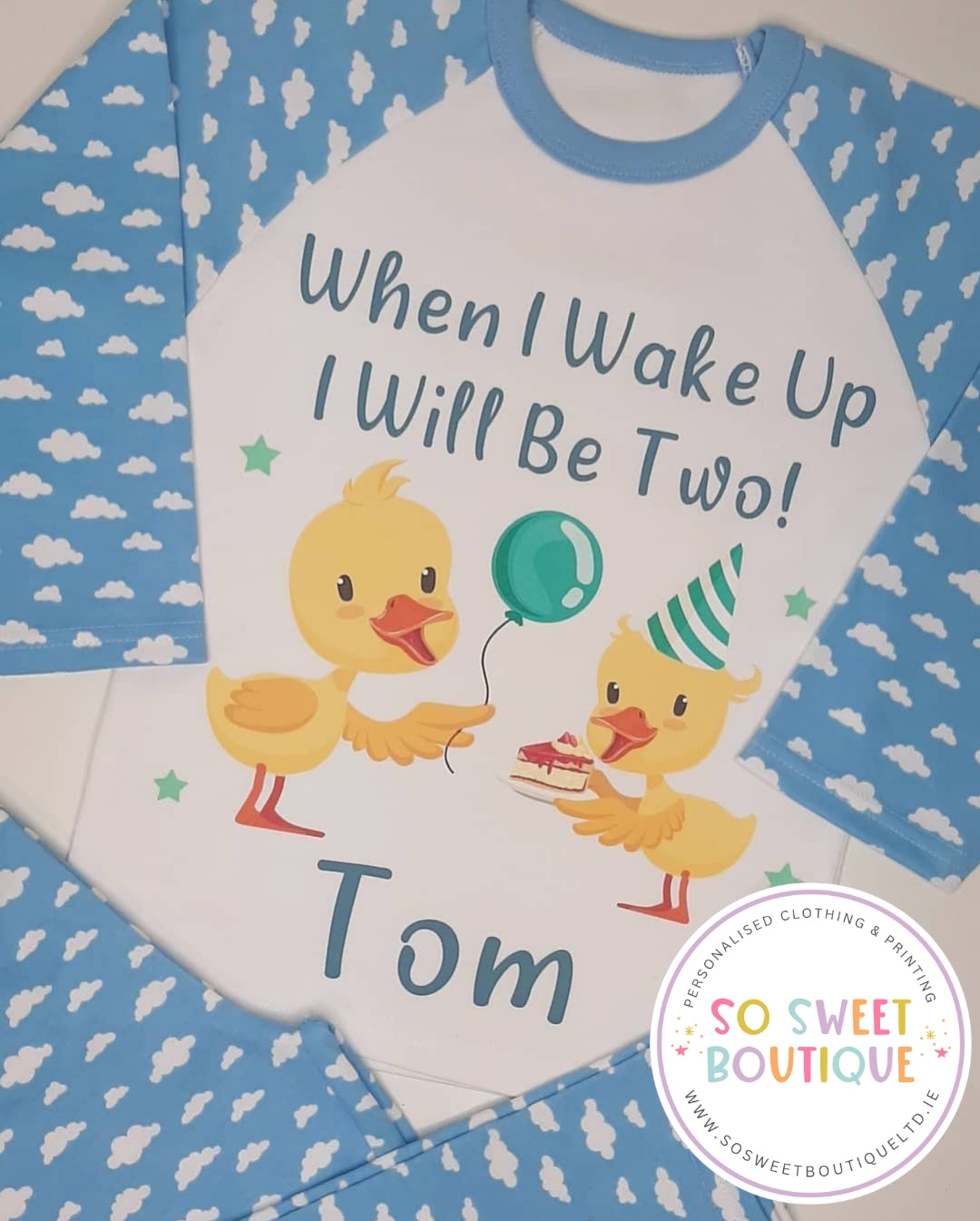 Personalised birthday pyjamas for kids featuring a cute duckling design, made by SoSweetBoutiqueLtd, perfect for special mornings.