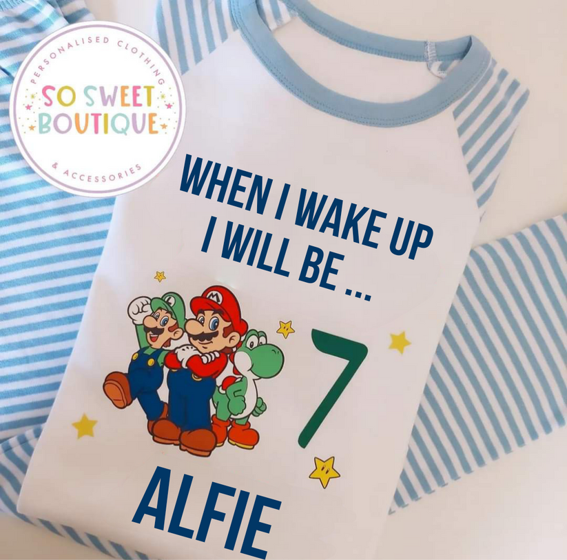 Super Mario themed personalized birthday pyjamas featuring colorful Mario graphics and custom name, perfect for a fun celebration.