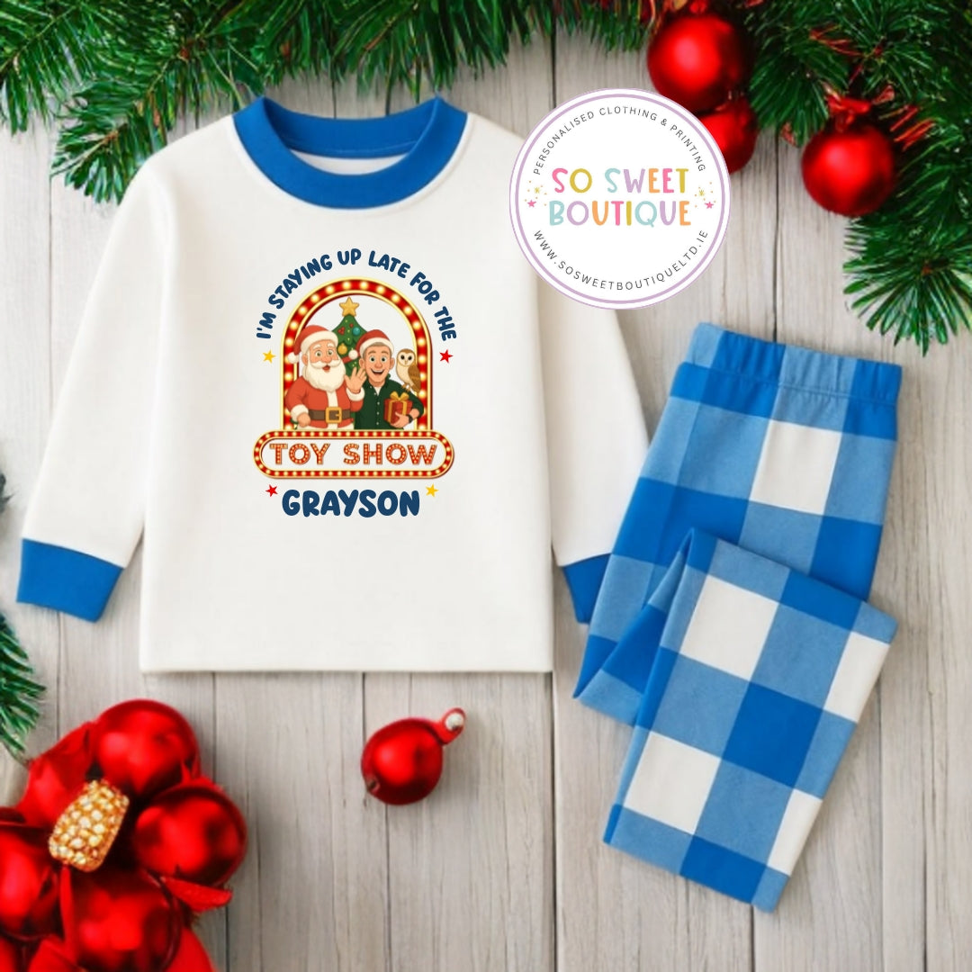 Personalised blue checkered pyjamas for kids by SoSweetBoutiqueLtd, featuring a comfortable, soft fabric with a playful checkered pattern.