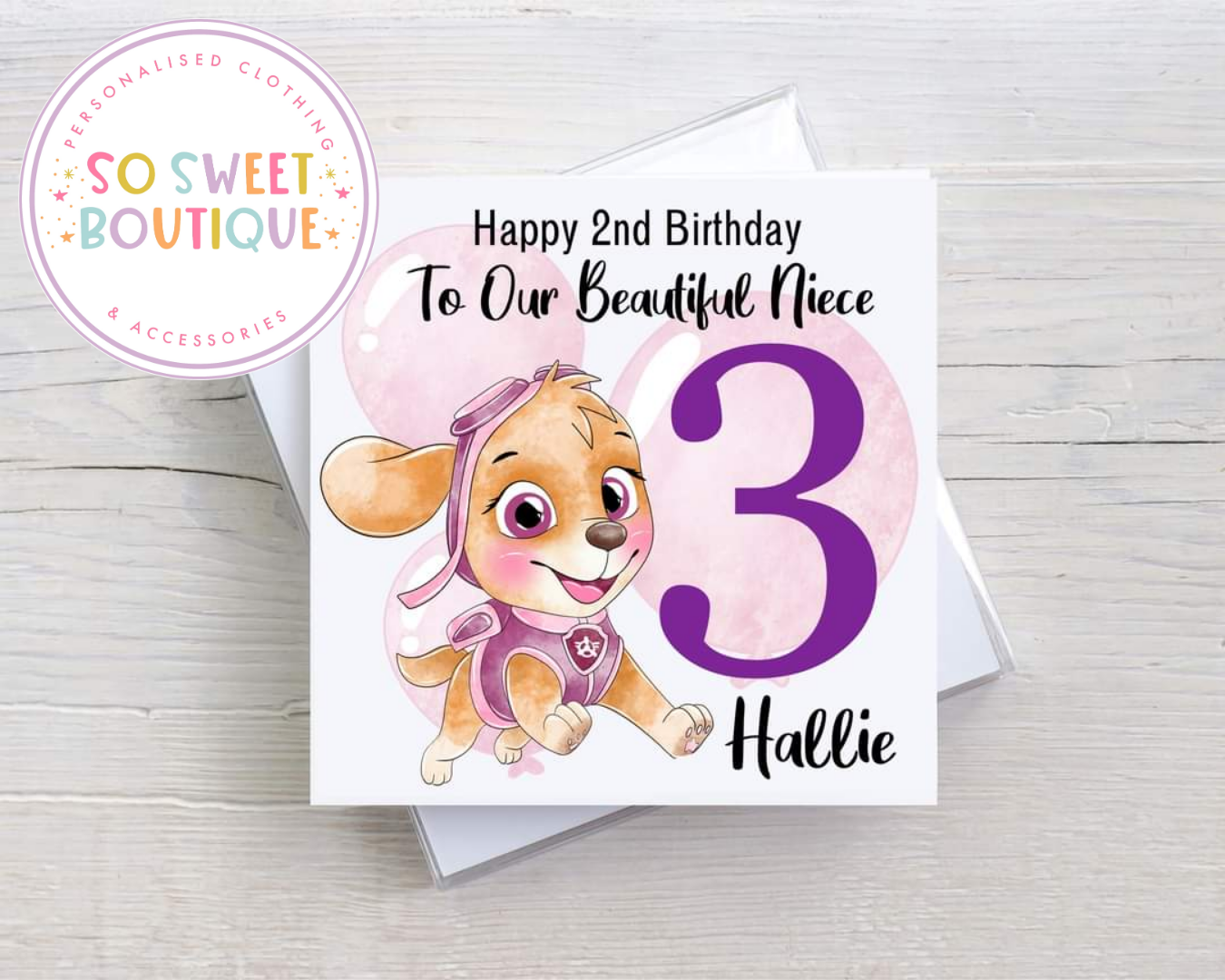 Personalized Skye Paw Patrol birthday card with colorful Paw Patrol characters and space for custom message, designed by SoSweetBoutiqueLtd.