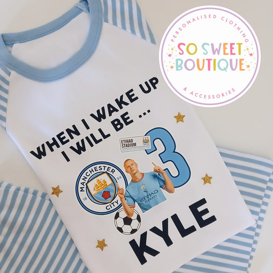 Personalized Man City birthday pyjamas by SoSweetBoutiqueLtd featuring custom text and Manchester City logo on soft fabric.