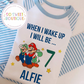 Super Mario themed personalized birthday pyjamas featuring colorful Mario graphics and custom name, perfect for a fun celebration.