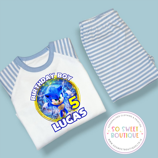 Personalized Sonic the Hedgehog birthday pajamas from SoSweetBoutiqueLtd, featuring colorful Sonic design on soft fabric.