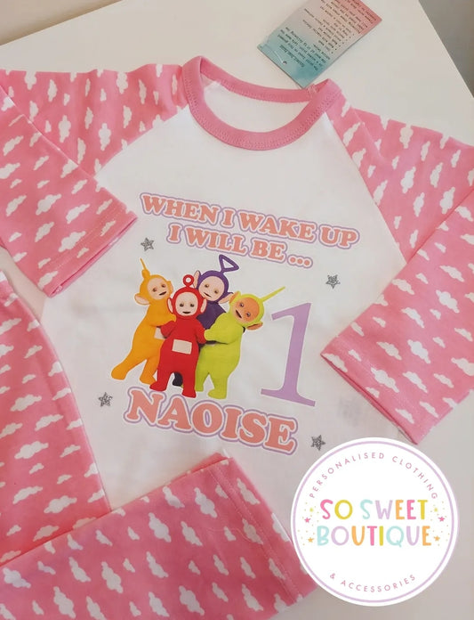 Personalised Teletubbies birthday pyjamas by SoSweetBoutiqueLtd featuring colorful Teletubbies characters on soft fabric.