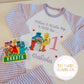 Personalized Sesame Street birthday pyjamas from SoSweetBoutiqueLtd featuring colorful Sesame Street characters on soft fabric.